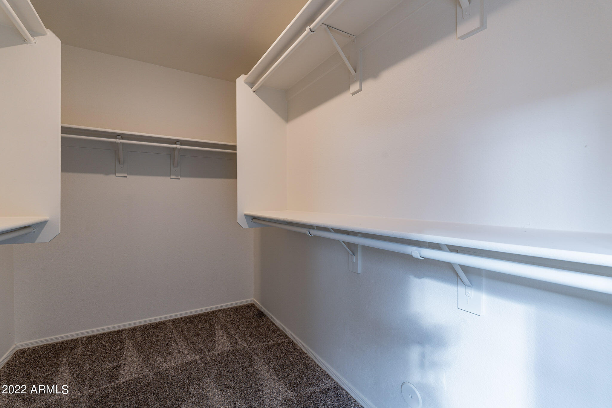 12454 West Granada Road Avondale, AZ 85392 - Photo 27 of 37 Primary Walkin Closet