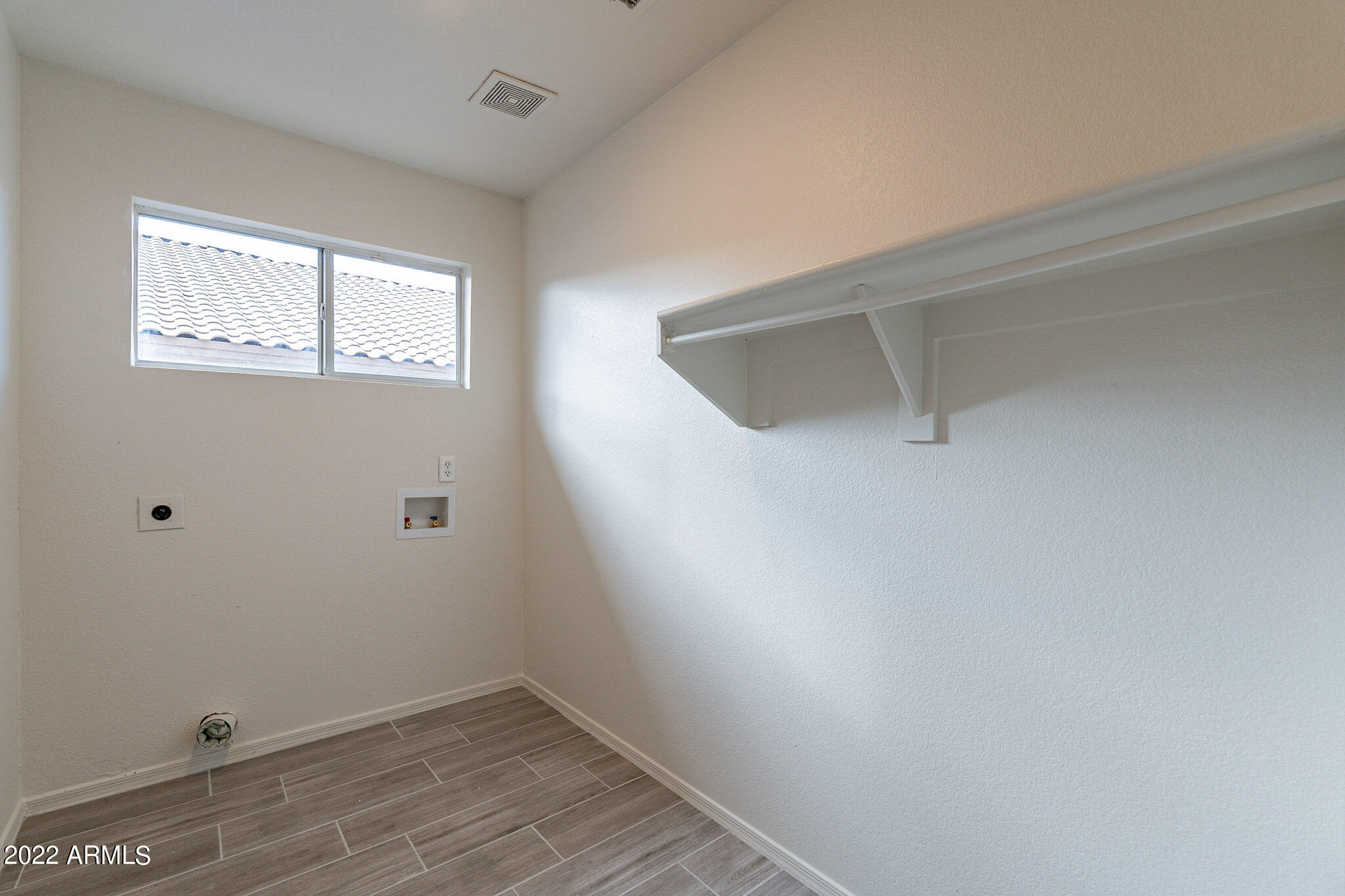 12454 West Granada Road Avondale, AZ 85392 - Photo 33 of 37 Inside Laundry