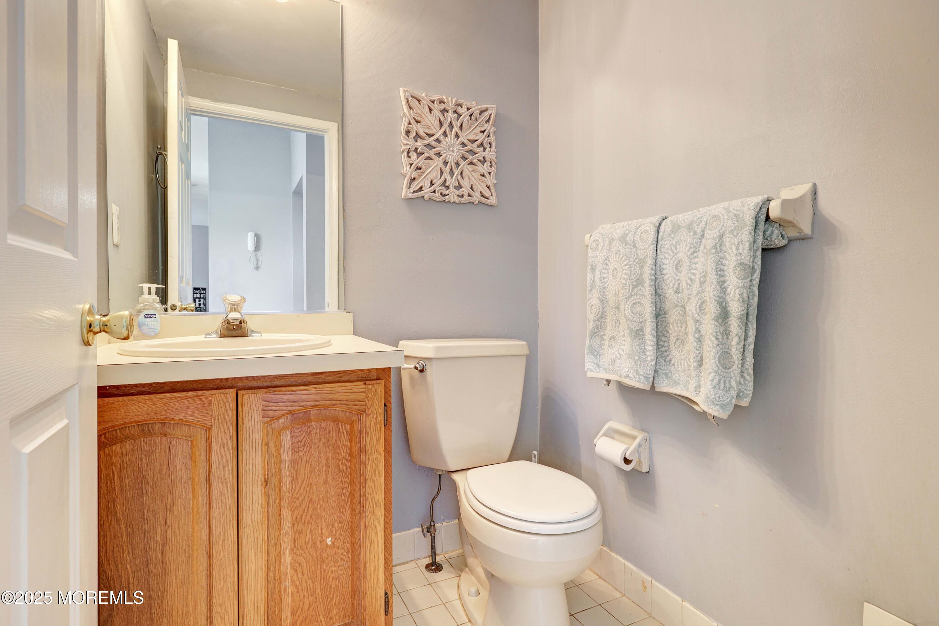 1 Exeter Pass Colts Neck, NJ 07722 - Photo 20 of 42 a bathroom with a sink toilet and shower
