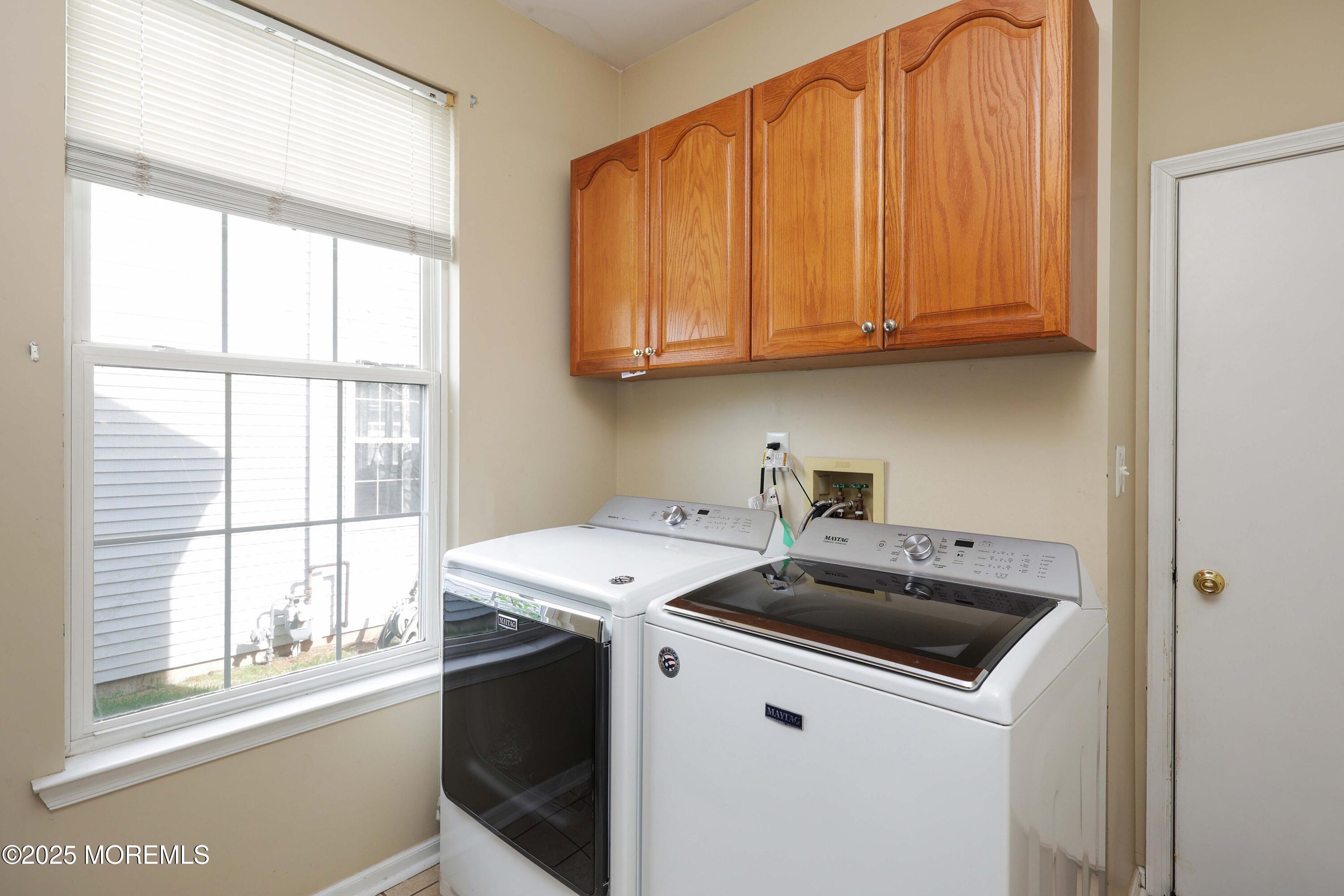 1 Exeter Pass Colts Neck, NJ 07722 - Photo 21 of 42 a utility room with dryer and washer