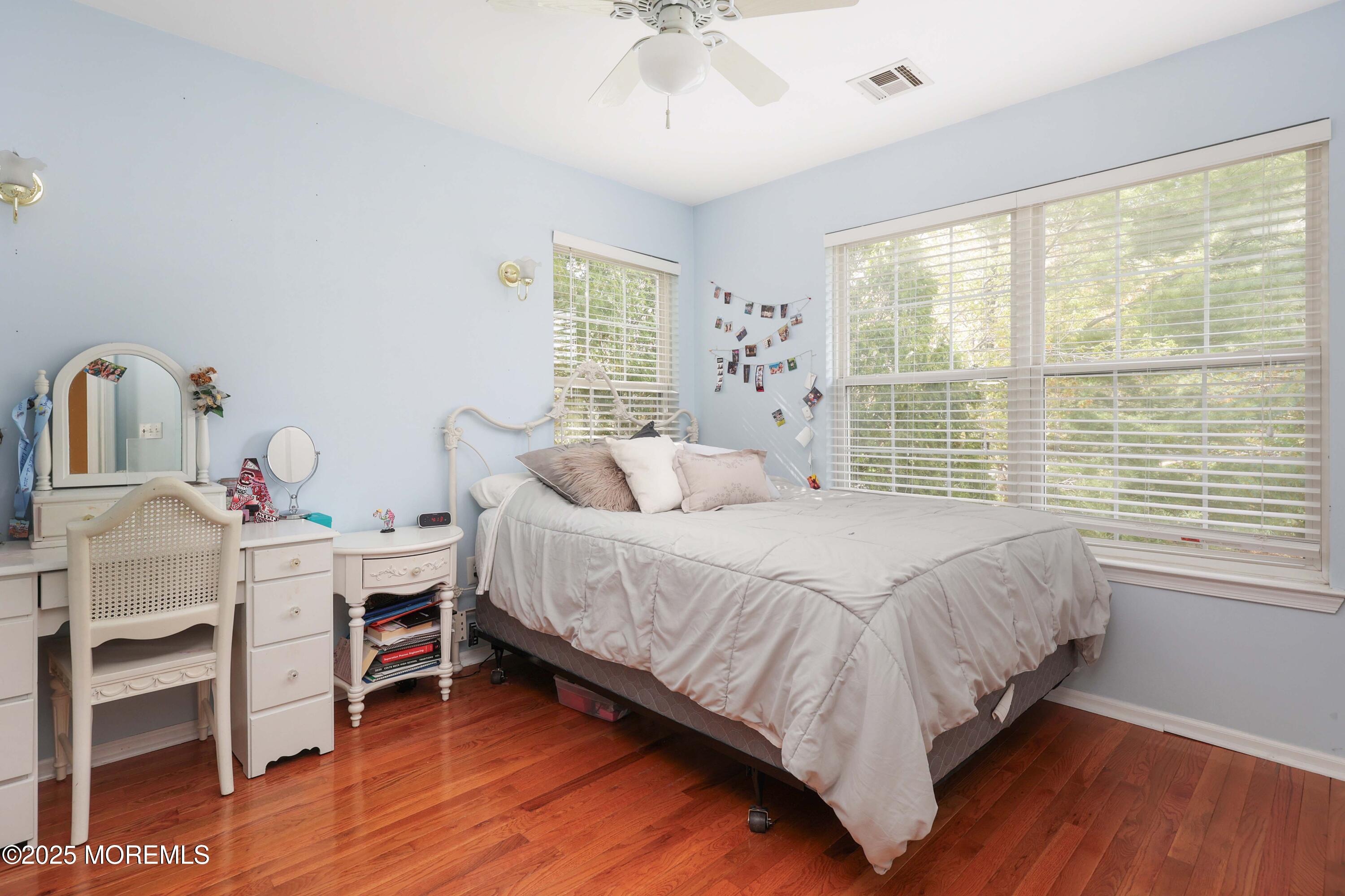 1 Exeter Pass Colts Neck, NJ 07722 - Photo 28 of 42 a bedroom with a bed and a window