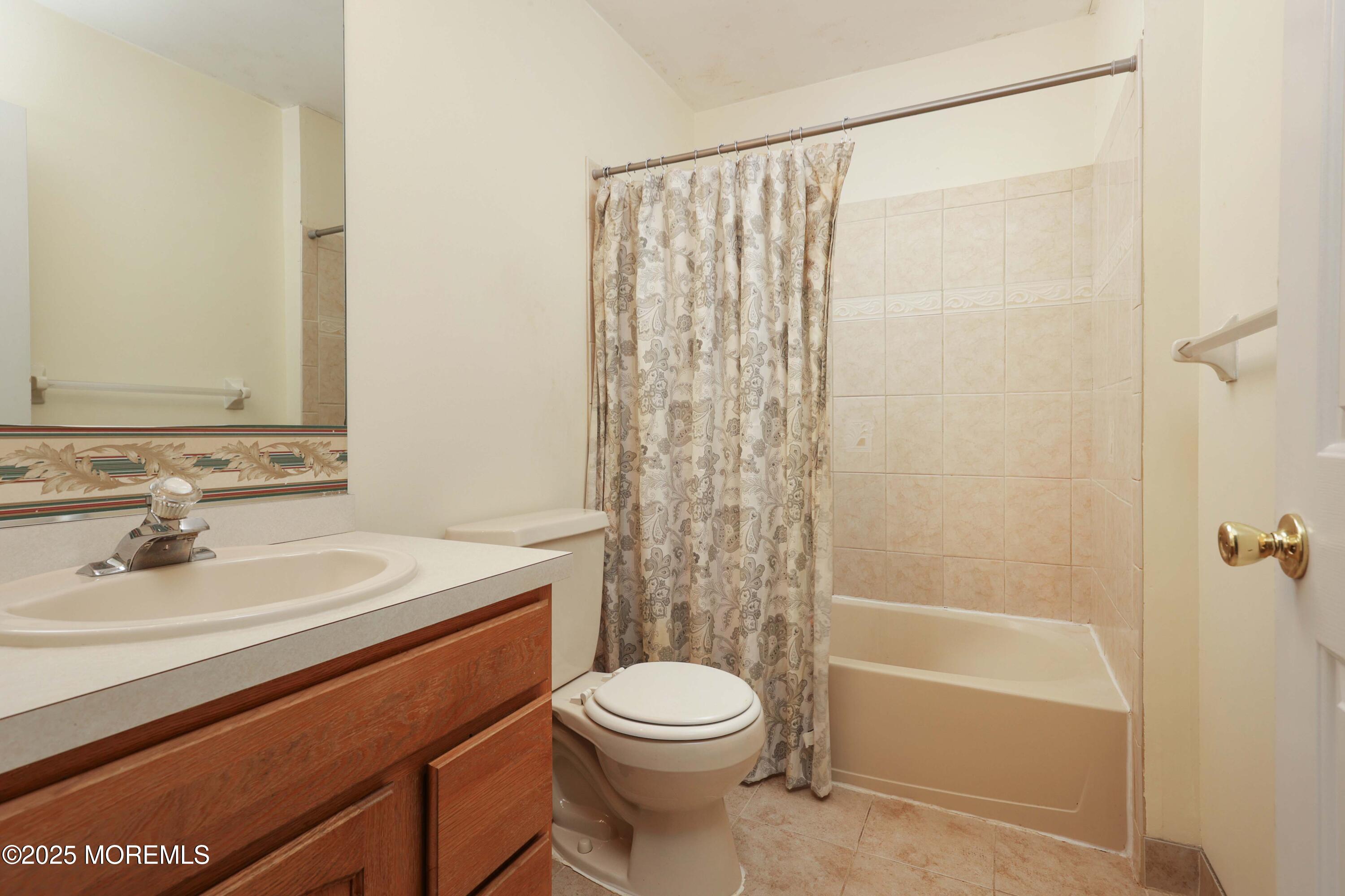 1 Exeter Pass Colts Neck, NJ 07722 - Photo 30 of 42 a bathroom with a sink a toilet and shower
