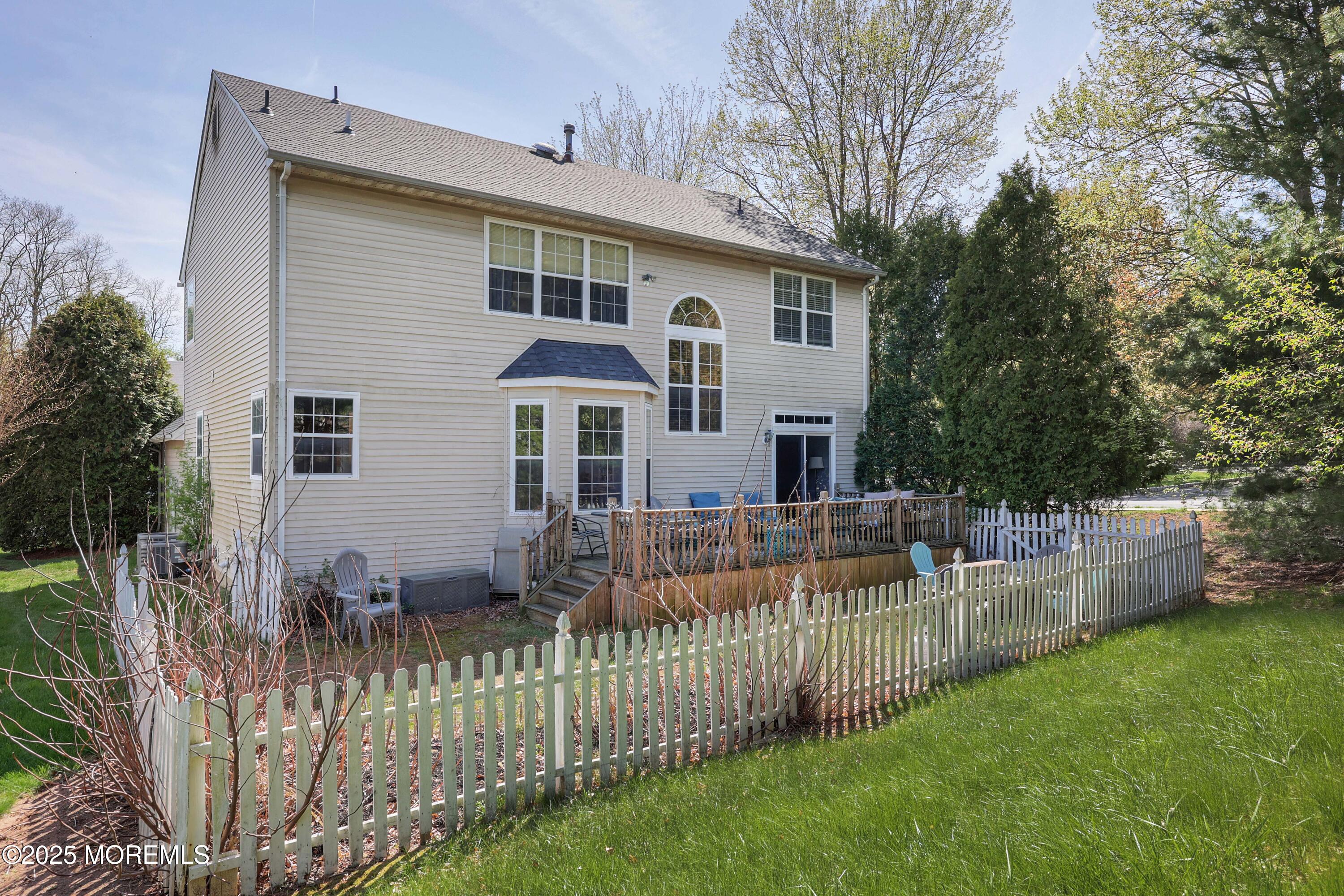 1 Exeter Pass Colts Neck, NJ 07722 - Photo 34 of 42 a front view of a house with a yard