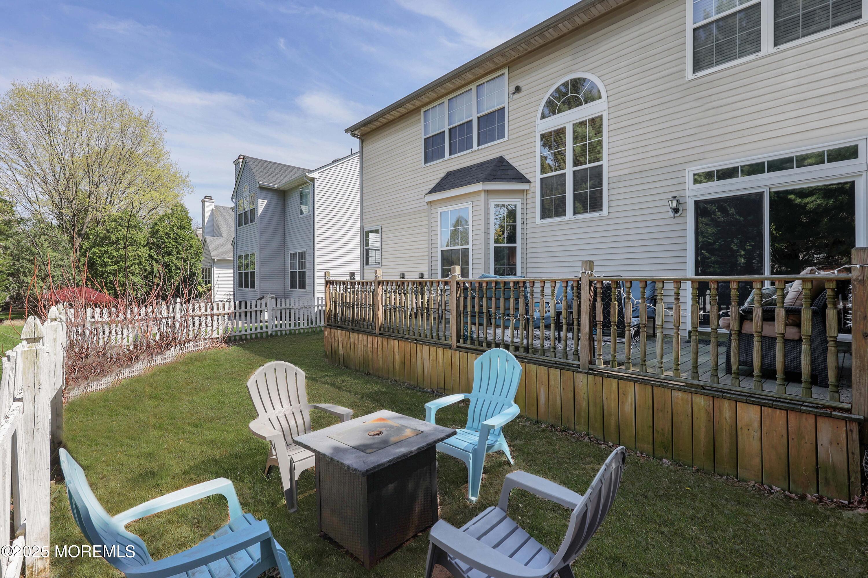 1 Exeter Pass Colts Neck, NJ 07722 - Photo 35 of 42 a view of a chair and table in the patio