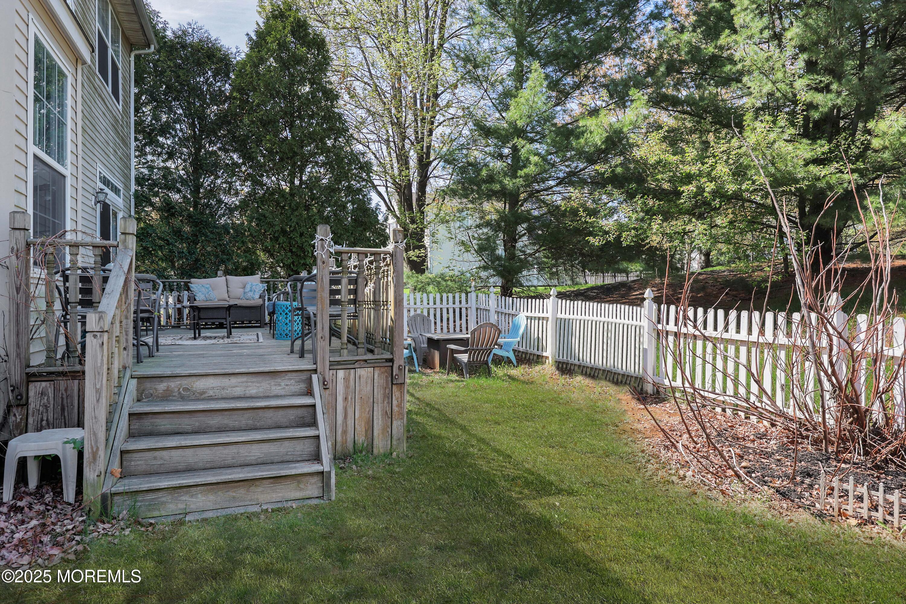 1 Exeter Pass Colts Neck, NJ 07722 - Photo 36 of 42 a view of a garden with deck