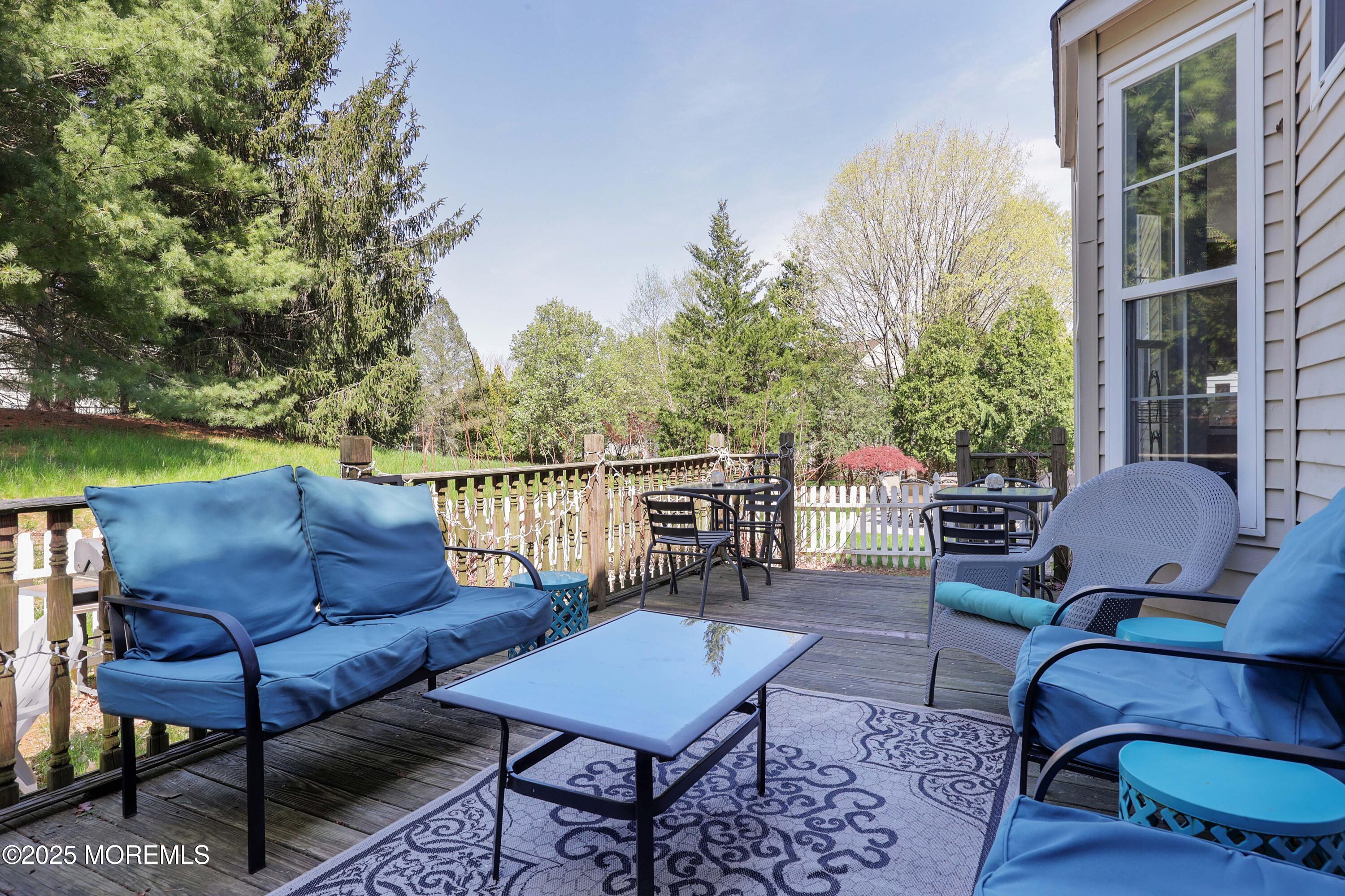 1 Exeter Pass Colts Neck, NJ 07722 - Photo 38 of 42 a outdoor living space with furniture and a potted plant