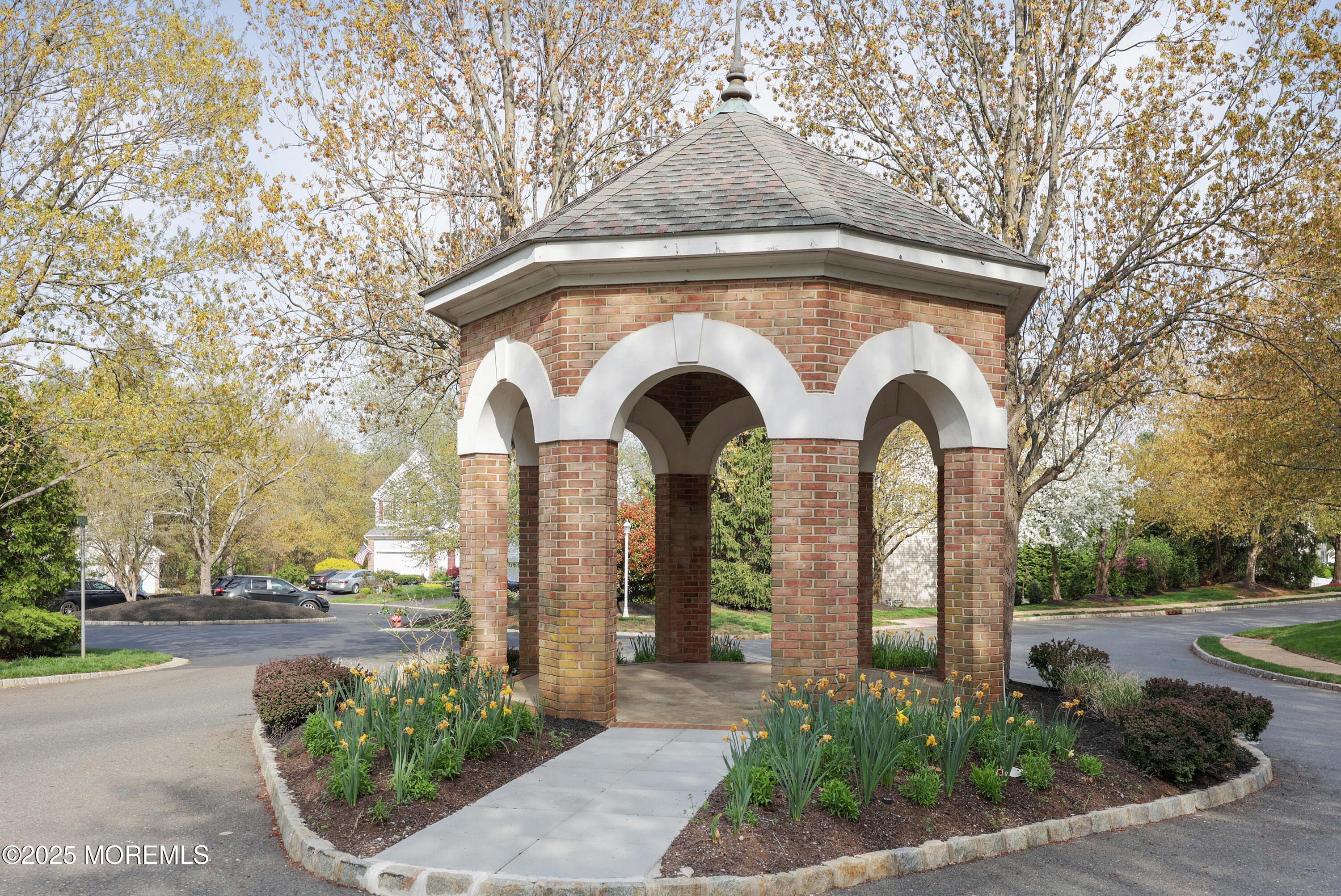 1 Exeter Pass Colts Neck, NJ 07722 - Photo 6 of 42 a front view of a house with garden