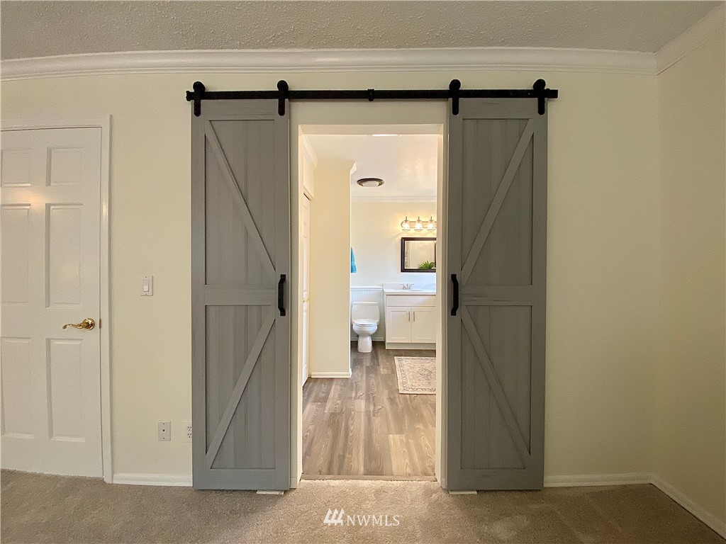 14902 175th Avenue Southeast Renton, WA 98059 - Photo 20 of 39 a view of a glass door and a door