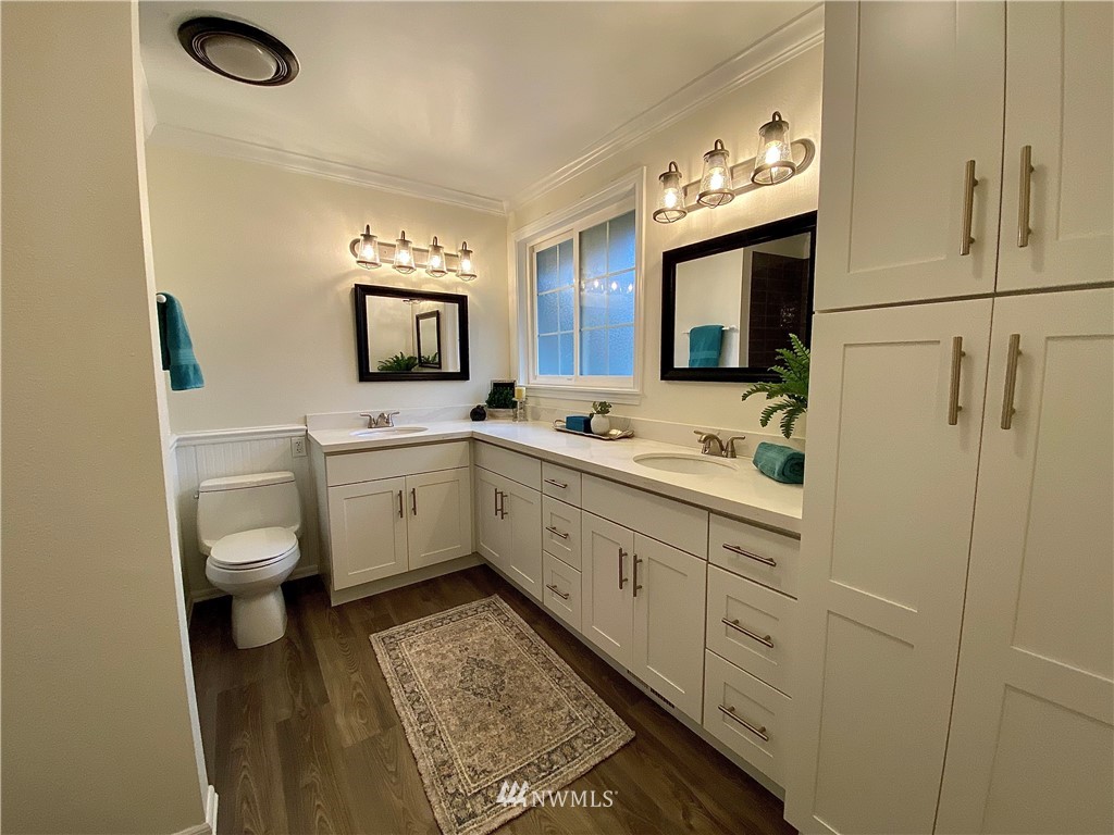14902 175th Avenue Southeast Renton, WA 98059 - Photo 22 of 39 a bathroom with a double vanity sink mirror and toilet