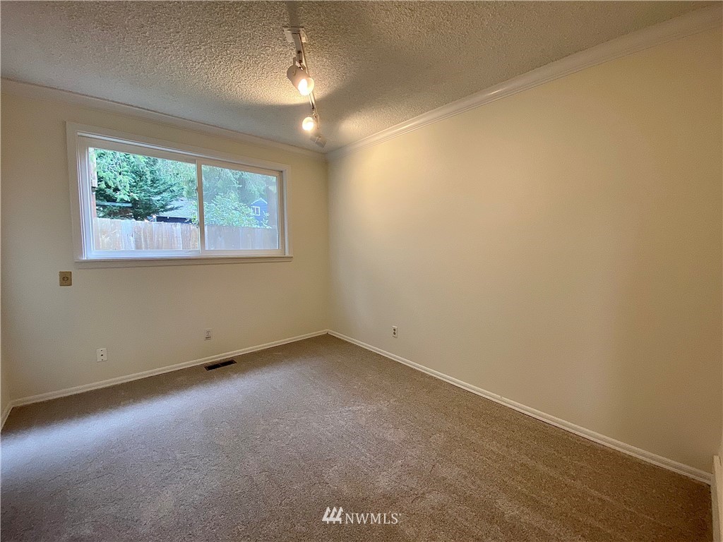 14902 175th Avenue Southeast Renton, WA 98059 - Photo 25 of 39 an empty room with a window