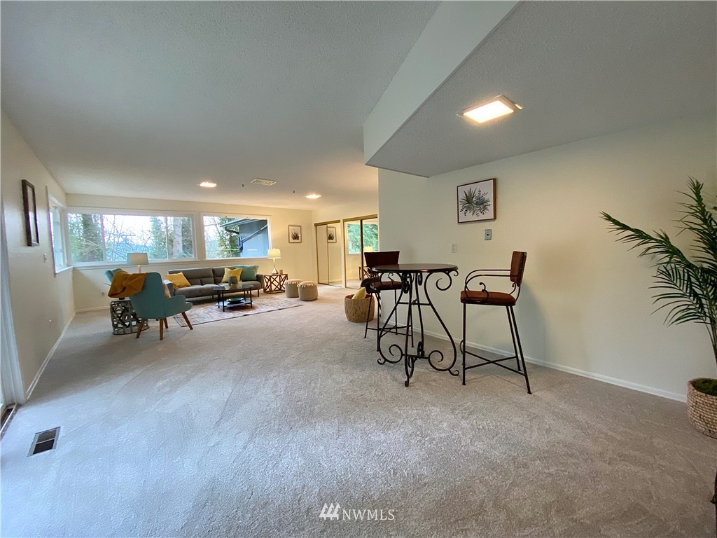 14902 175th Avenue Southeast Renton, WA 98059 - Photo 26 of 39 a view of a livingroom with furniture and a window