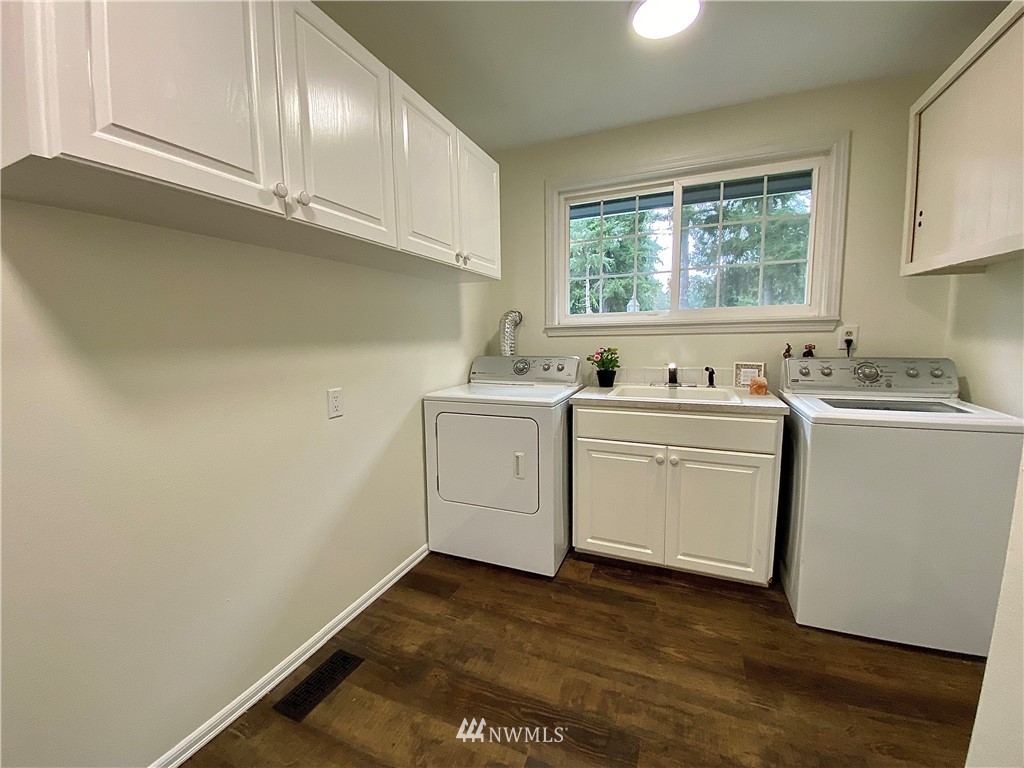 14902 175th Avenue Southeast Renton, WA 98059 - Photo 32 of 39 a view of a storage & utility room with a window