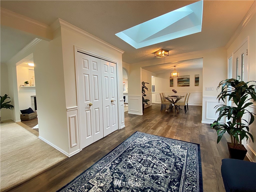 14902 175th Avenue Southeast Renton, WA 98059 - Photo 5 of 39 a view of a living room and dining room