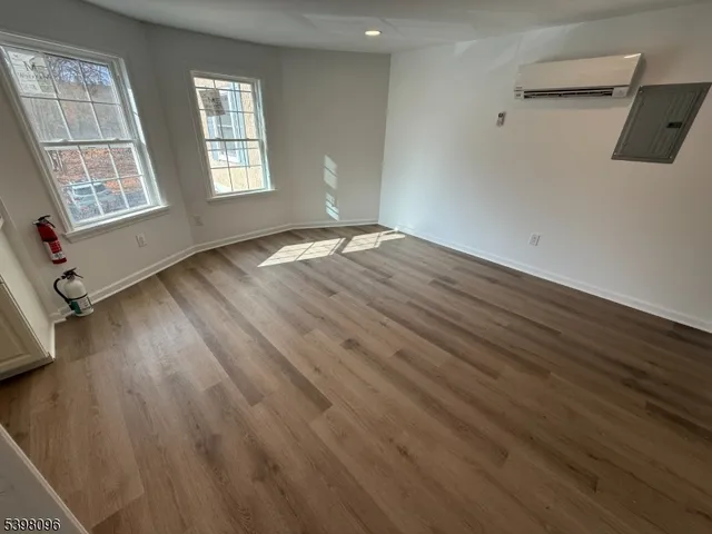 a view of livingroom with hardwood floor and window