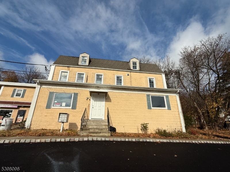 173 Highway 46, Unit 2A Mine Hill, NJ 07803 - Photo 7 of 7 a front view of a house with a yard