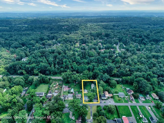 a view of a garden with a building