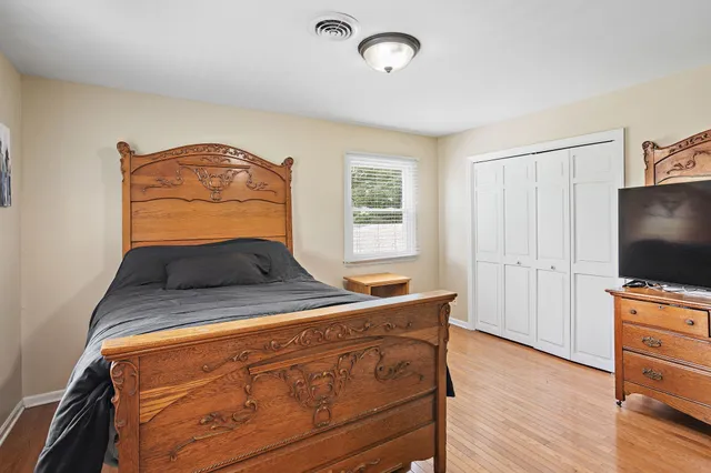 a room with furniture and flat screen tv