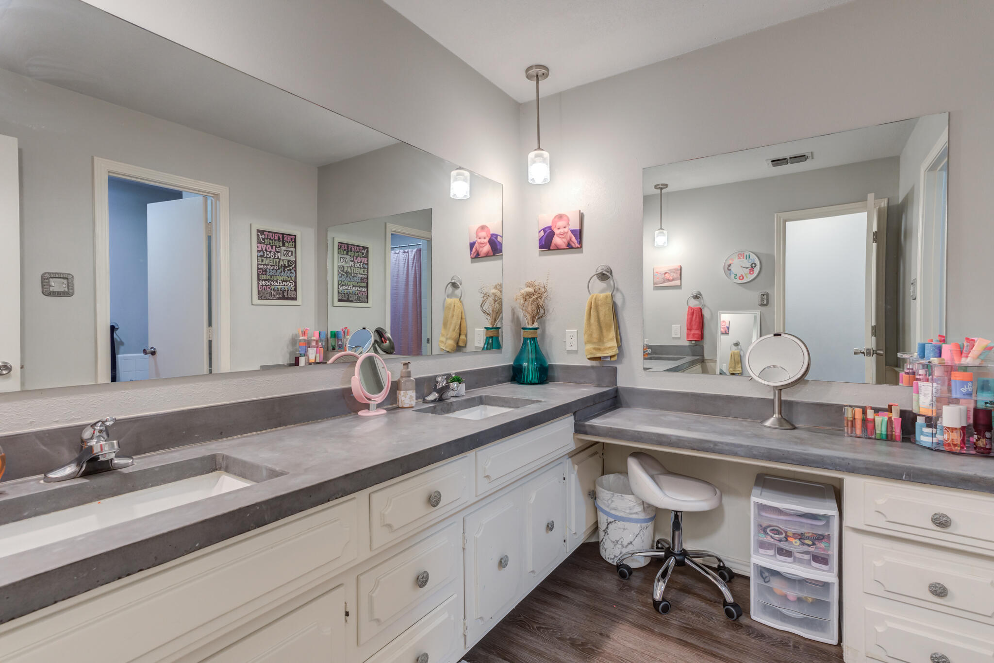3410 76th Street Lubbock, TX 79423 - Photo 29 of 38 a bathroom with a sink and a mirror