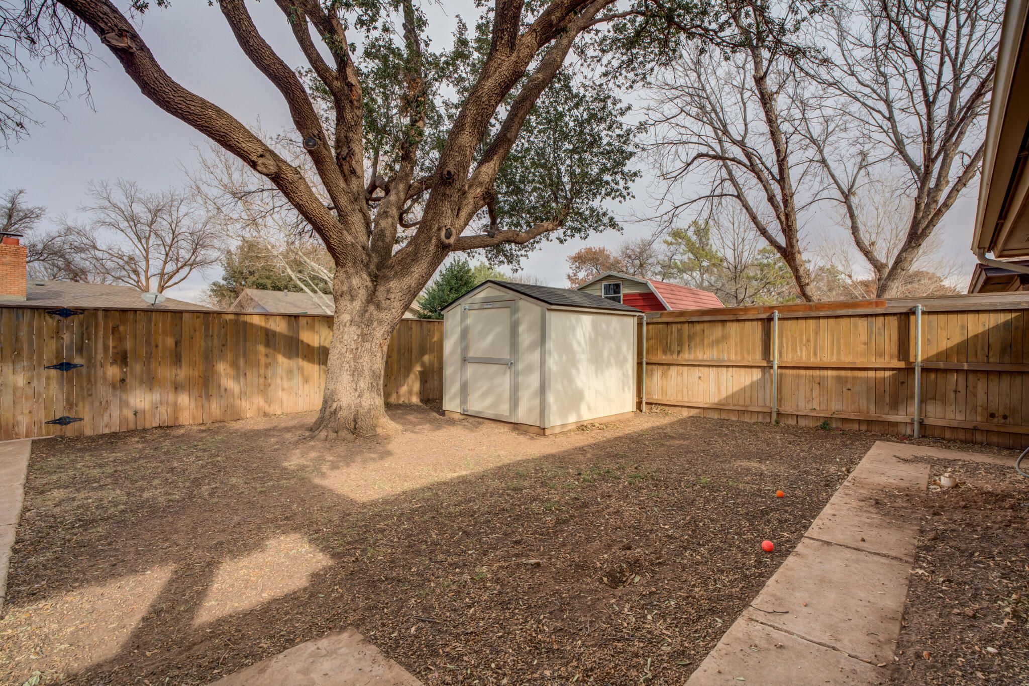 3410 76th Street Lubbock, TX 79423 - Photo 36 of 38 a view of backyard with wooden fence
