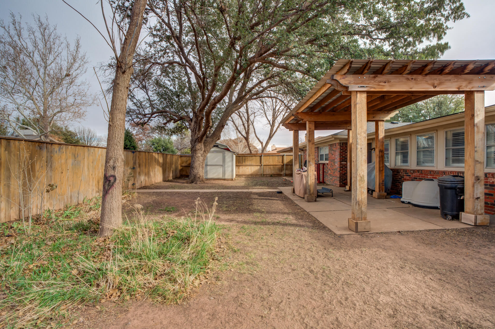 3410 76th Street Lubbock, TX 79423 - Photo 38 of 38 a view of a house with a yard