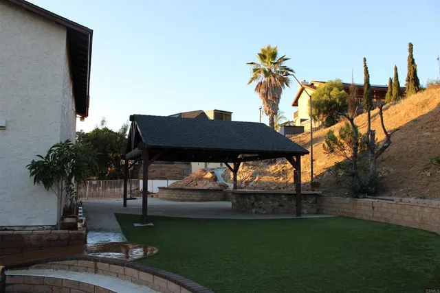 a view of a terrace with sitting area