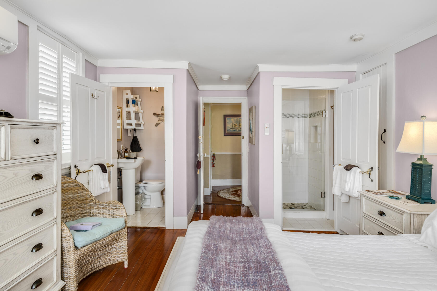 1861 Main Street Brewster, MA 02631 - Photo 17 of 65 a spacious bedroom with a bed and a view of living room