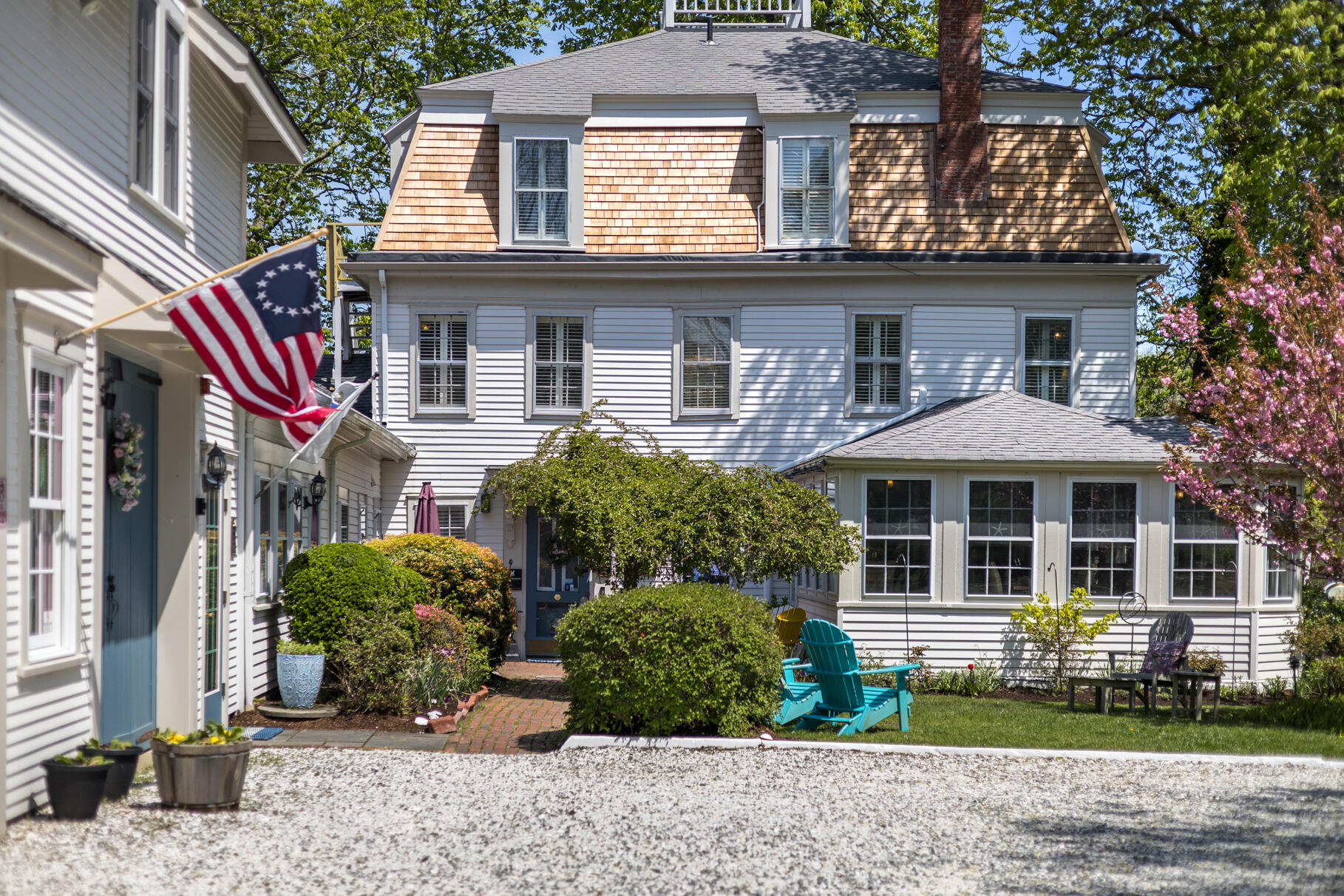1861 Main Street Brewster, MA 02631 - Photo 2 of 65 a front view of a house with garden