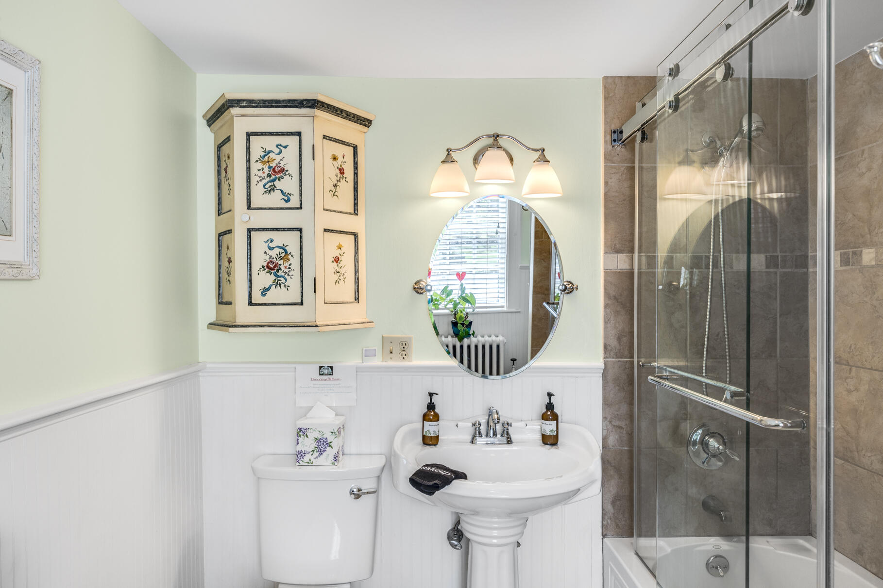 1861 Main Street Brewster, MA 02631 - Photo 25 of 65 a bathroom with a sink toilet and shower