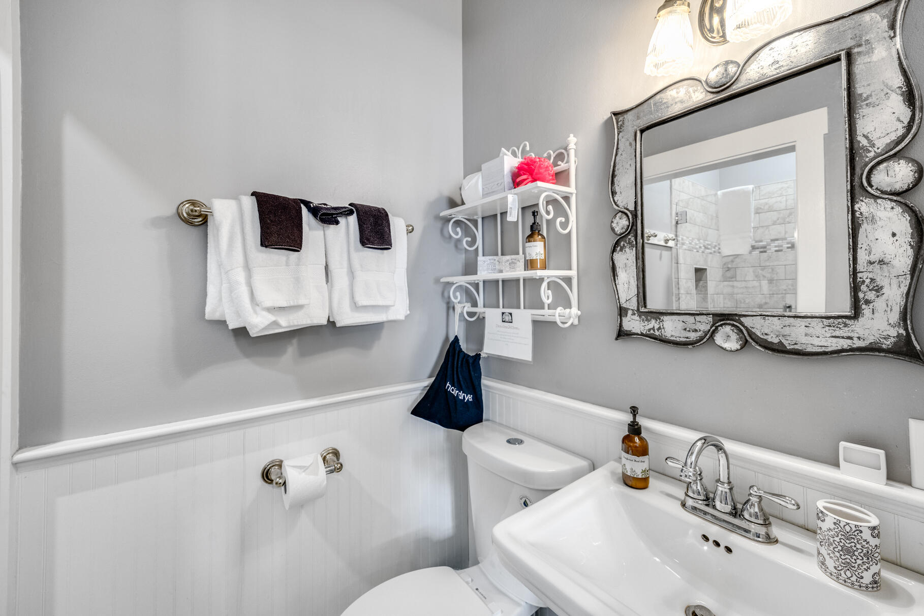 1861 Main Street Brewster, MA 02631 - Photo 31 of 65 a bathroom with a sink mirror and vanity