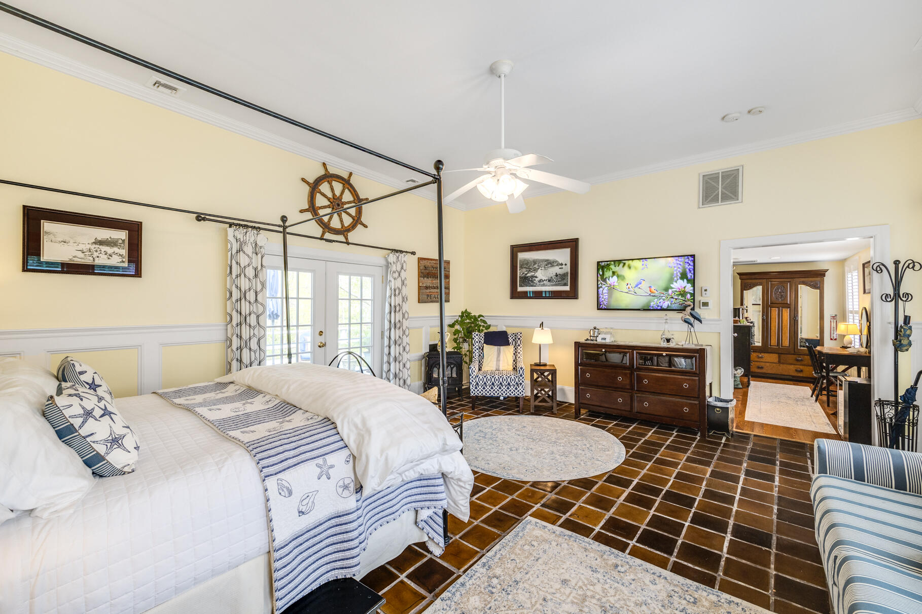 1861 Main Street Brewster, MA 02631 - Photo 39 of 65 a bedroom with double bed and a dresser