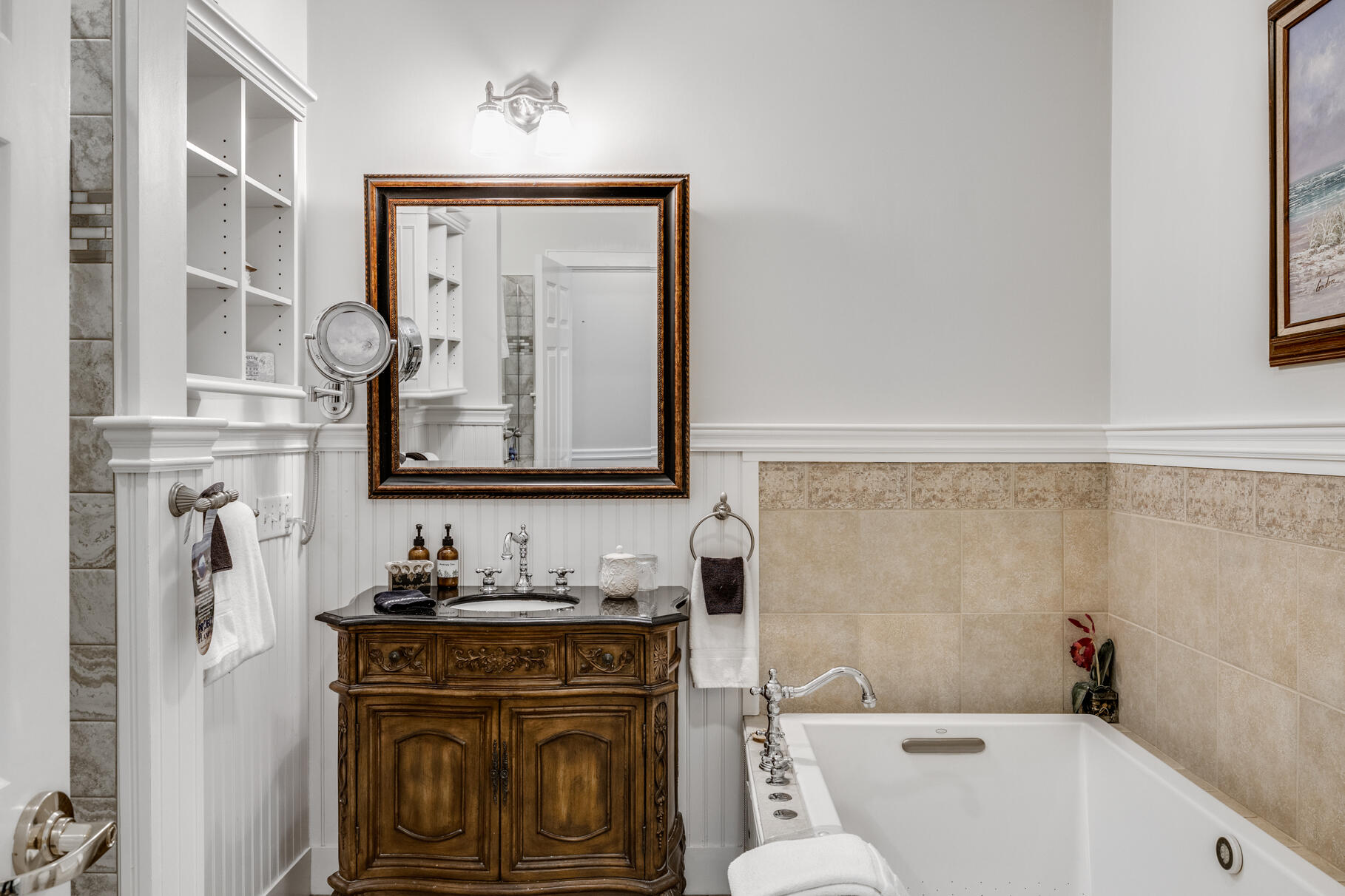 1861 Main Street Brewster, MA 02631 - Photo 43 of 65 a bathroom with a granite countertop sink and a mirror