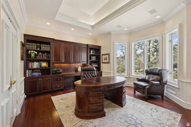 1714 Ridge Point Drive Bountiful, UT 84010 - Photo 58 of 132 Built-in custom cabinetry with integrated desk space, bay window with multiple panes, tray ceiling, recessed lighting, and wood-finish flooring