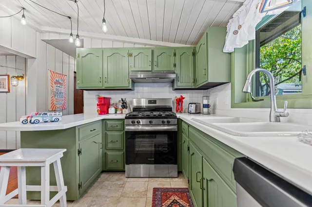 a bedroom with a bed and dresser