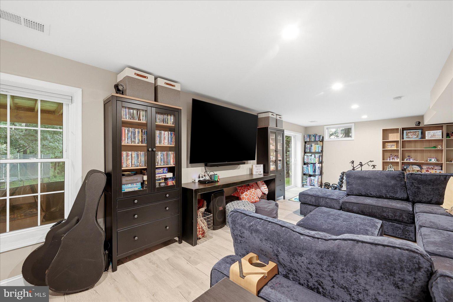 911 Riva Ridge Drive Great Falls, VA 22066 - Photo 33 of 55 Cozy entertainment space for gatherings.