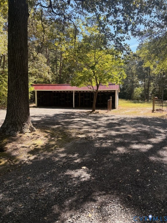 1033 Smithfield Road St. Stephens Church, VA 23148 - Photo 22 of 24 Outbuilding featuring a red metal roof and multipl