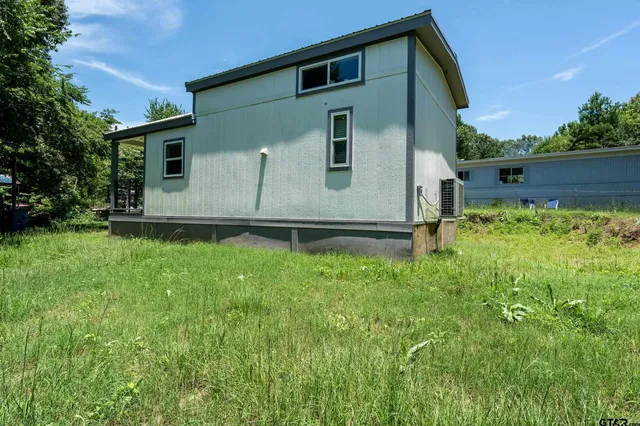a front view of house with yard