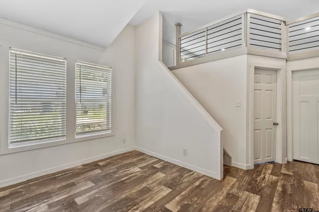 a view of a room with a window