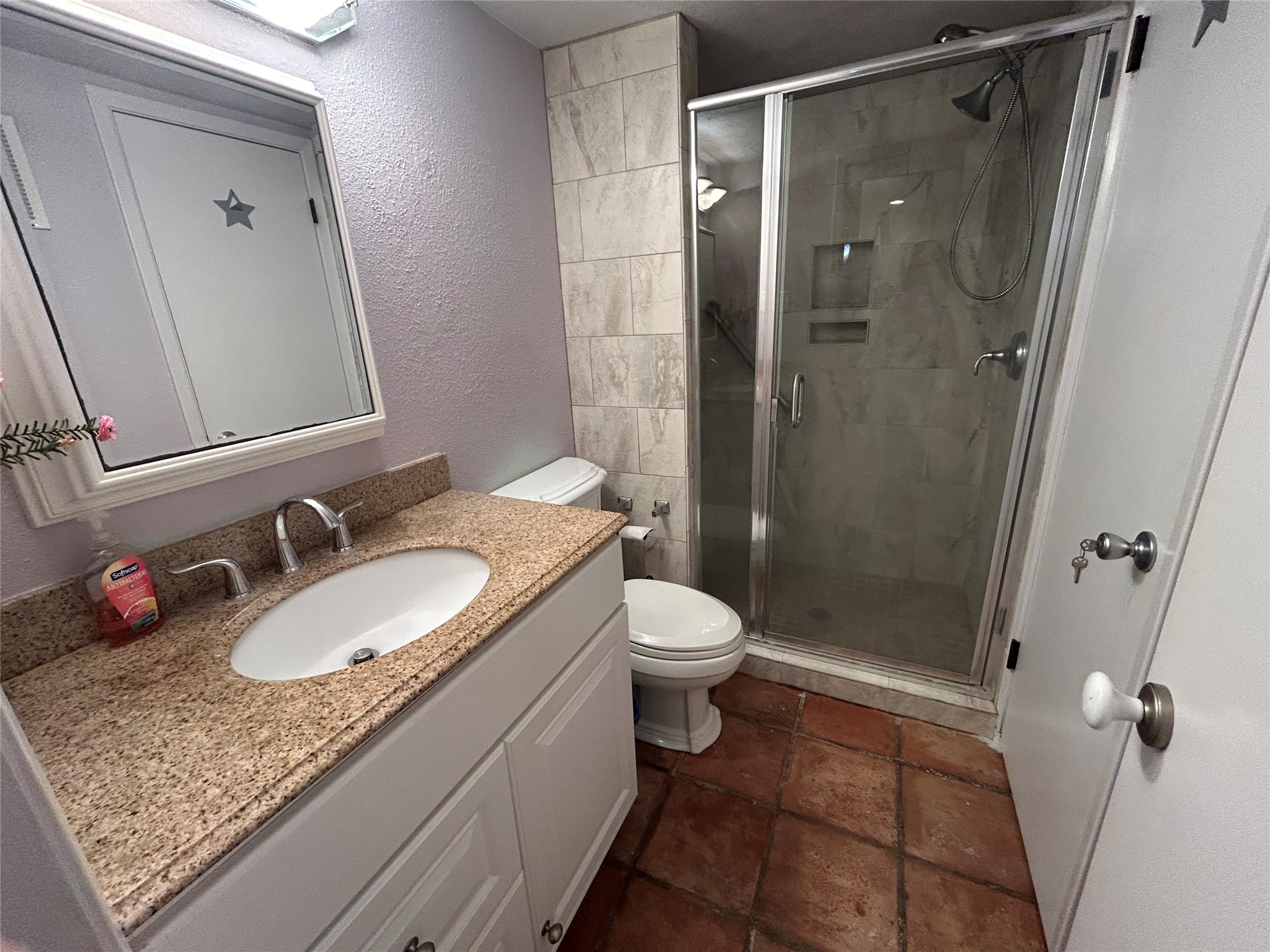 13034 Leader Street, Unit 965 Houston, TX 77072 - Photo 15 of 32 Primary bath downstairs- elegant shower w built-in shampoo and soap niches.