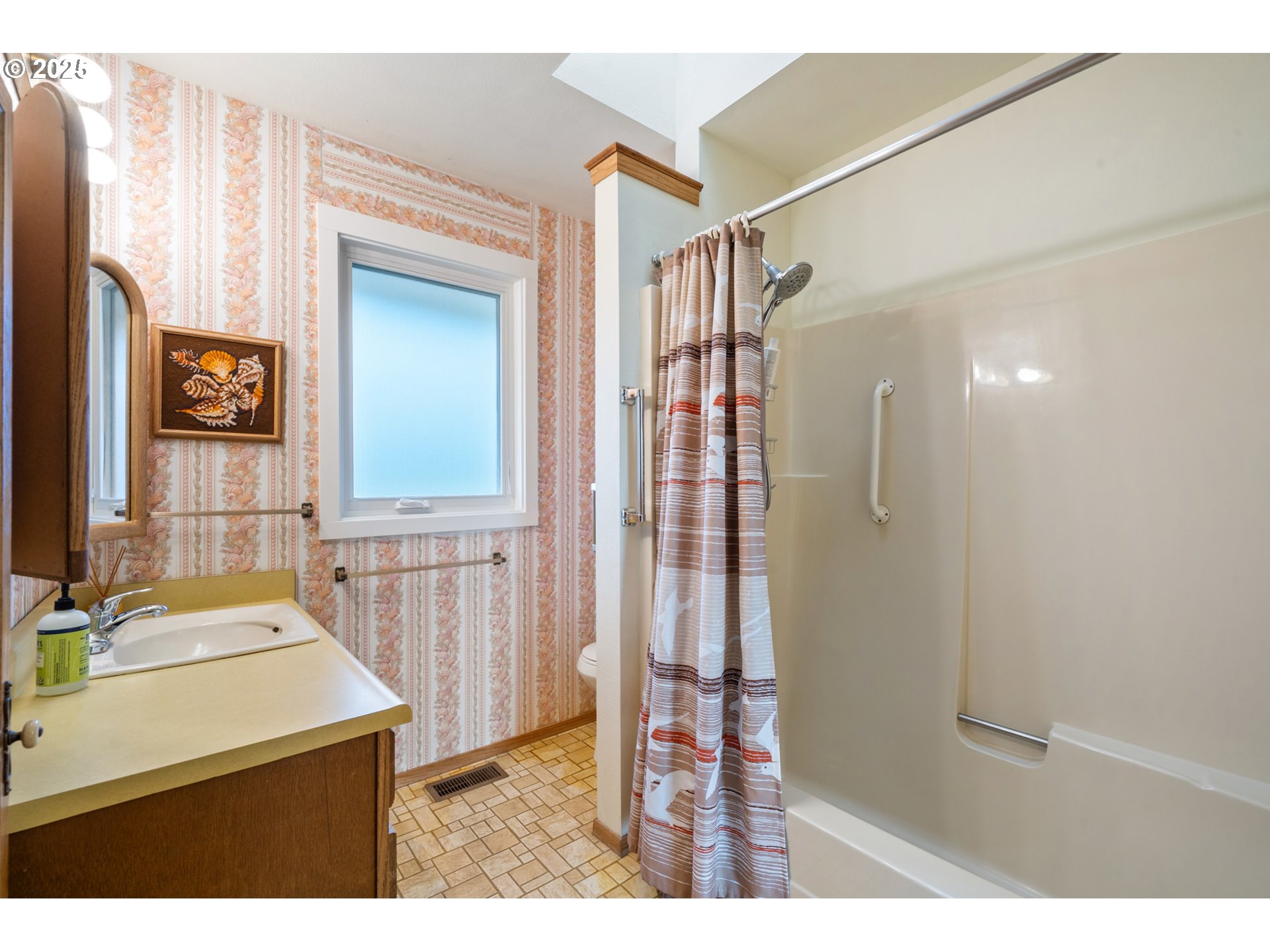 1100 Arthurs Road Oceanside, OR 97141 - Photo 29 of 48 a bathroom with a sink and a mirror