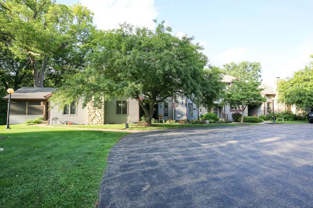 a view of a house with a garden