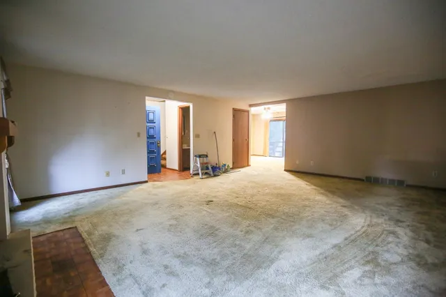 an empty room with a natural light