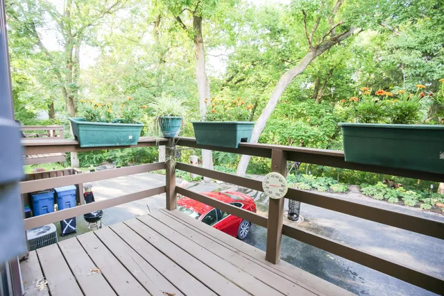 a view of chairs on the roof deck
