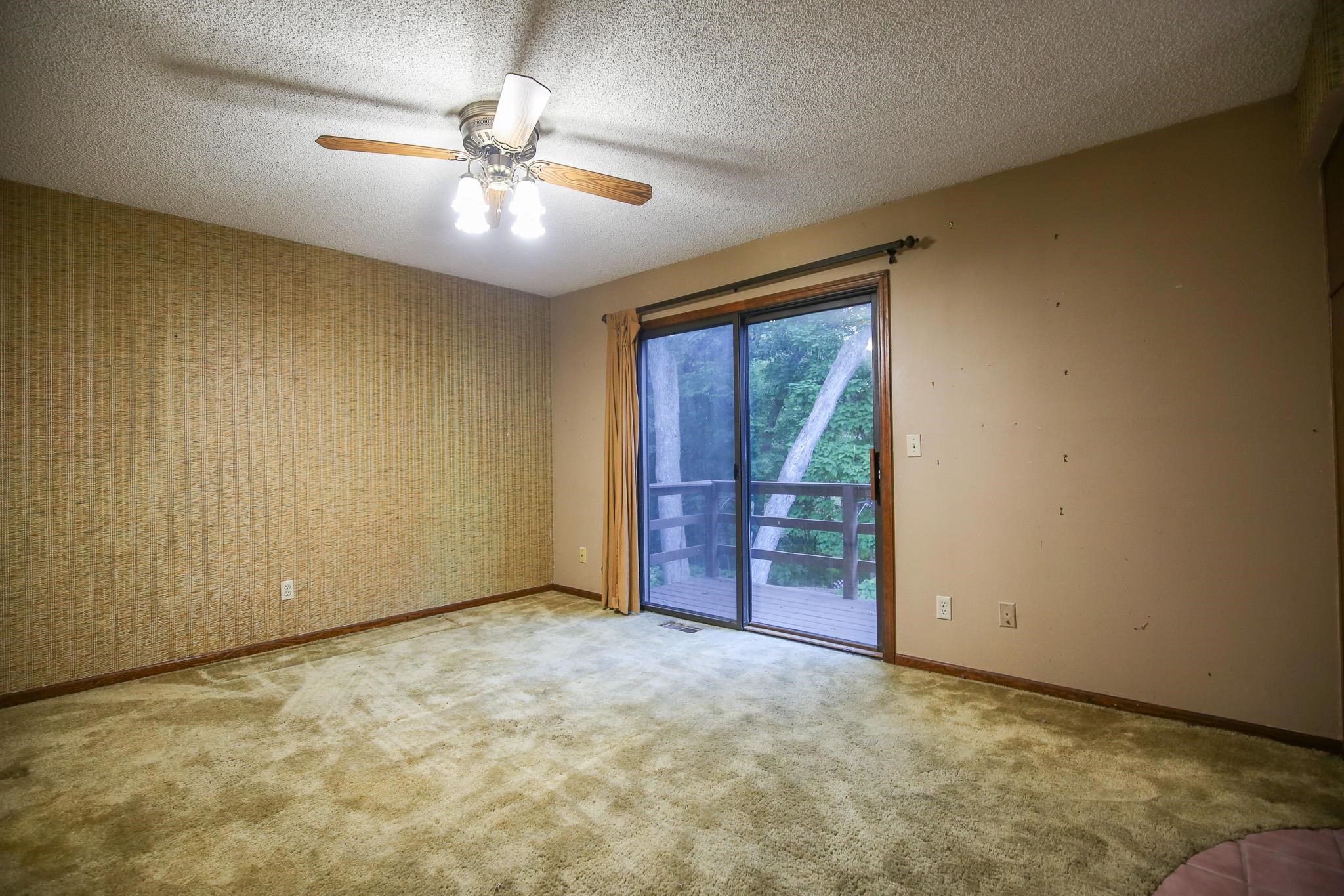 209 Fox Trot Dixon, IL 61021 - Photo 8 of 34 an empty room with fan and windows
