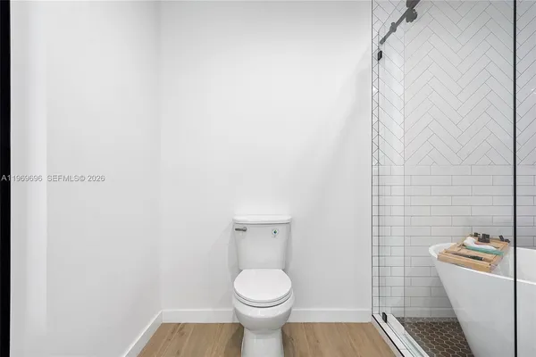 a bathroom with a toilet and a sink