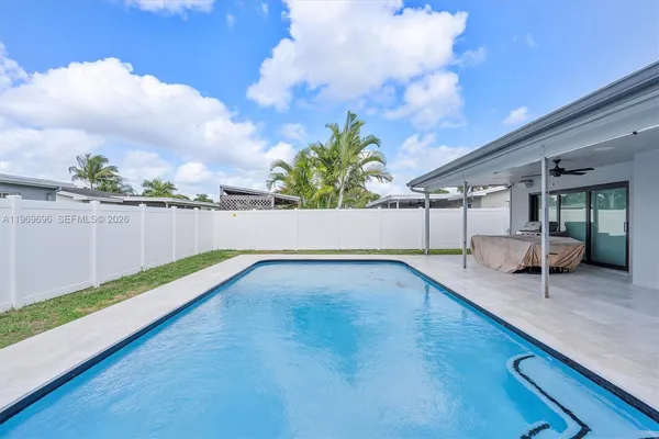 a view of outdoor space yard swimming pool and porch