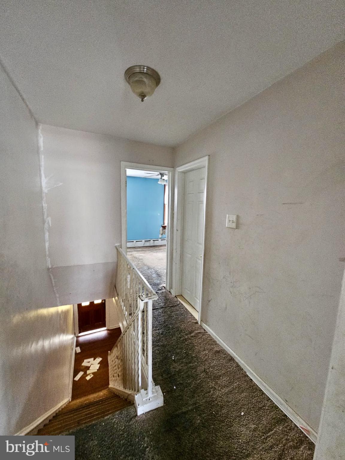 931 Kenmore Road Philadelphia, PA 19151 - Photo 7 of 11 a view of an empty room and wooden floor