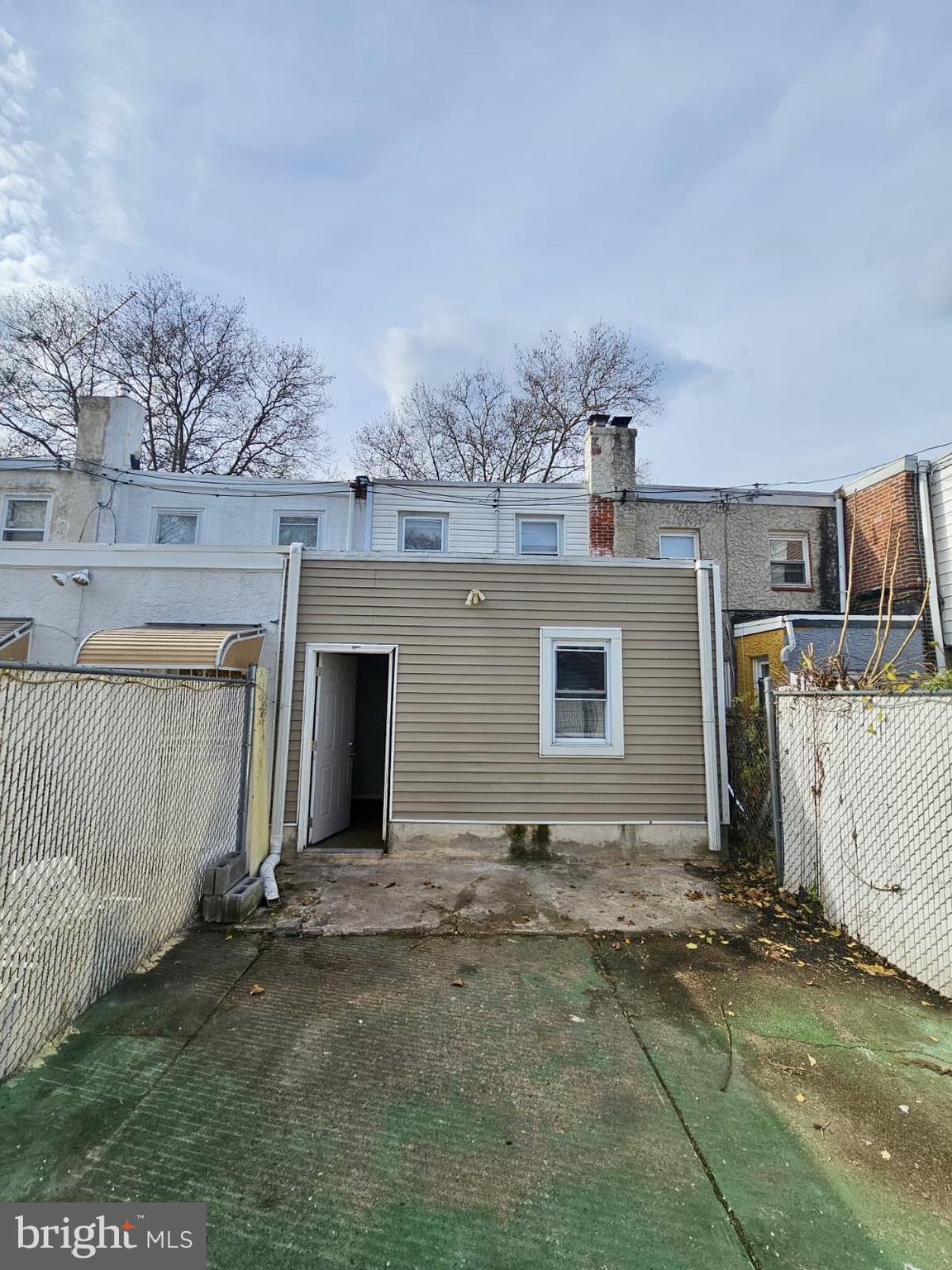 931 Kenmore Road Philadelphia, PA 19151 - Photo 10 of 11 a front view of a house with a garage