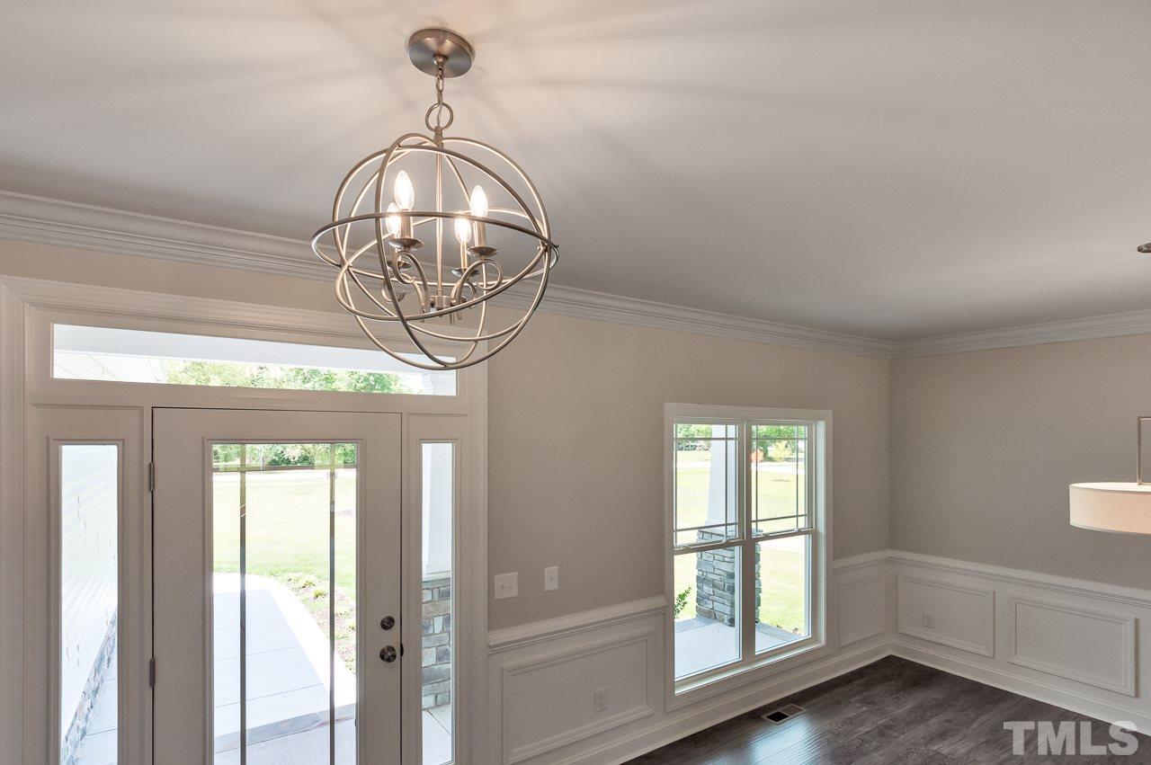 6733 Dwight Rowland Road Willow Spring, NC 27592 - Photo 10 of 25 Modern slick lines greet you in this spacious modern living for a busy family