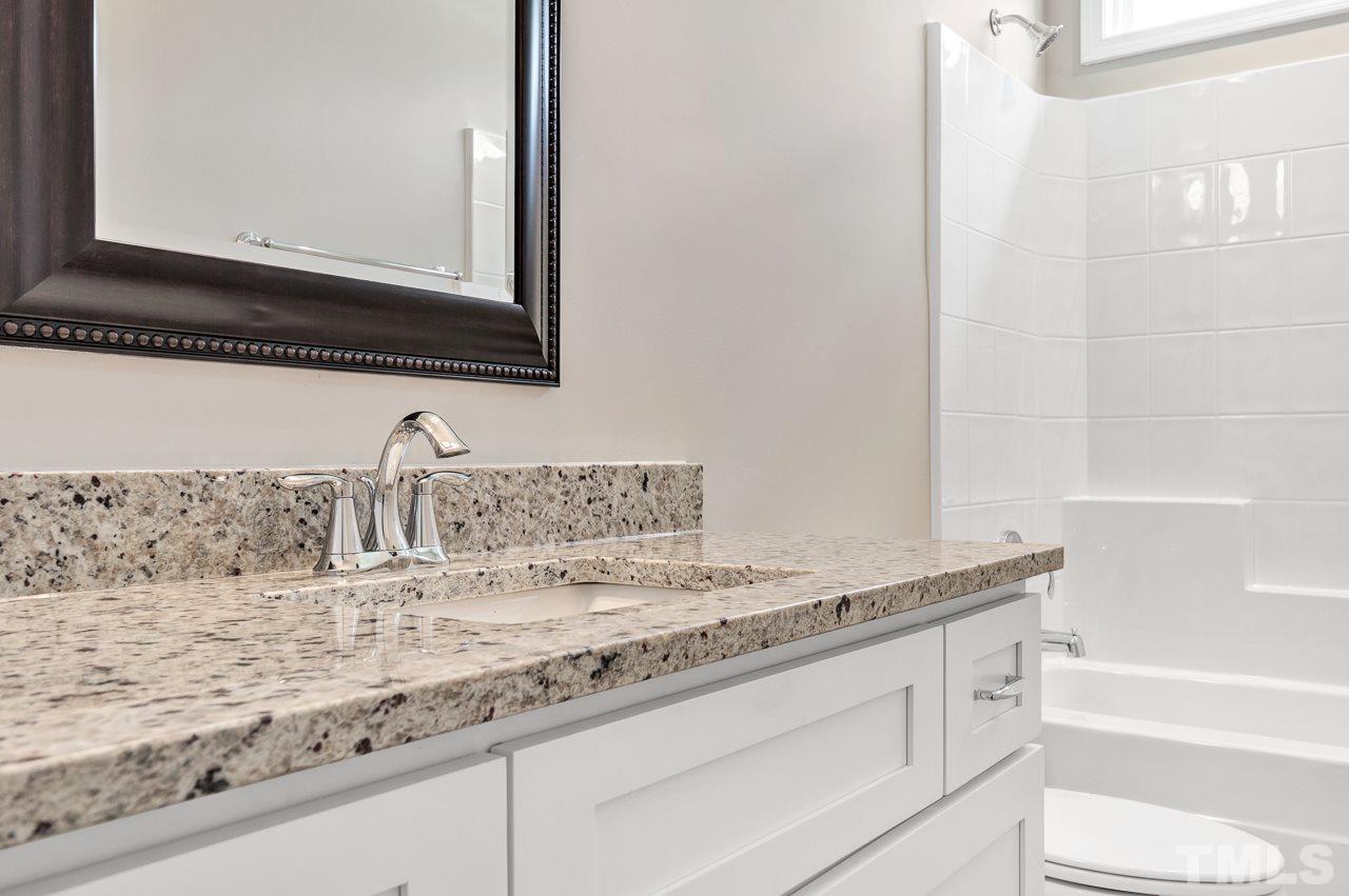 6733 Dwight Rowland Road Willow Spring, NC 27592 - Photo 13 of 25 Large cabinetry with nice updated countertops