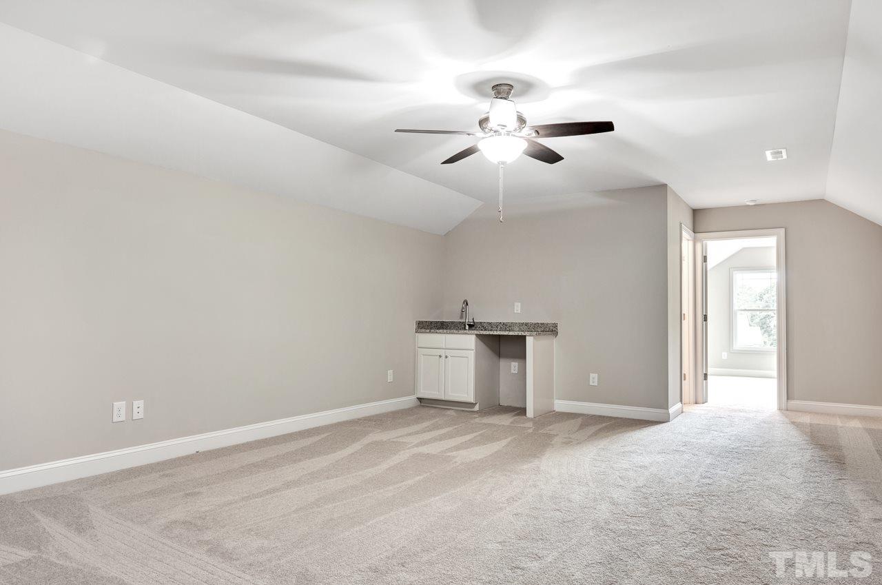 6733 Dwight Rowland Road Willow Spring, NC 27592 - Photo 20 of 25 Spacious bonus with wet bar or theatre room